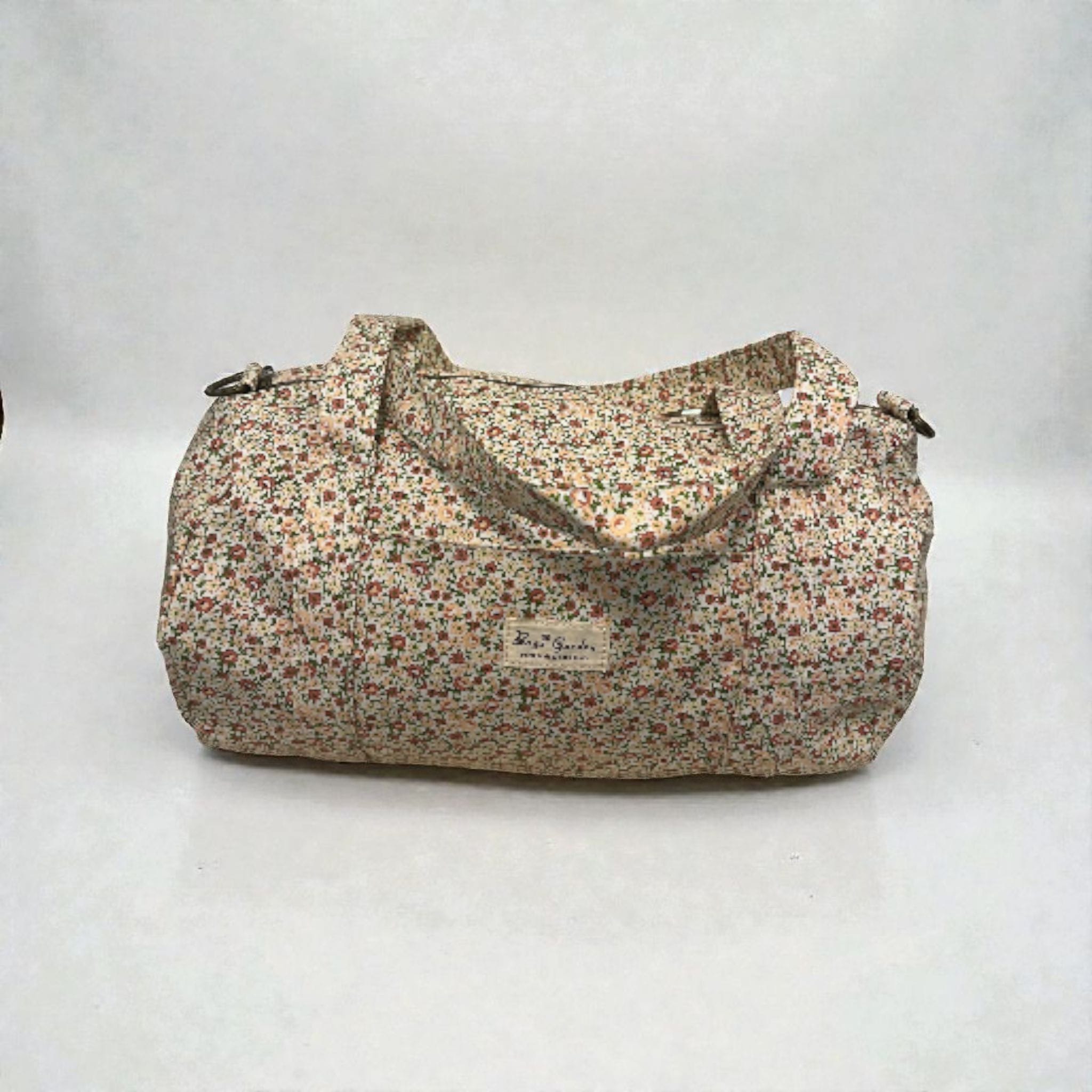 LIBERTY-  Bolsa de viaje azul con flores rosas