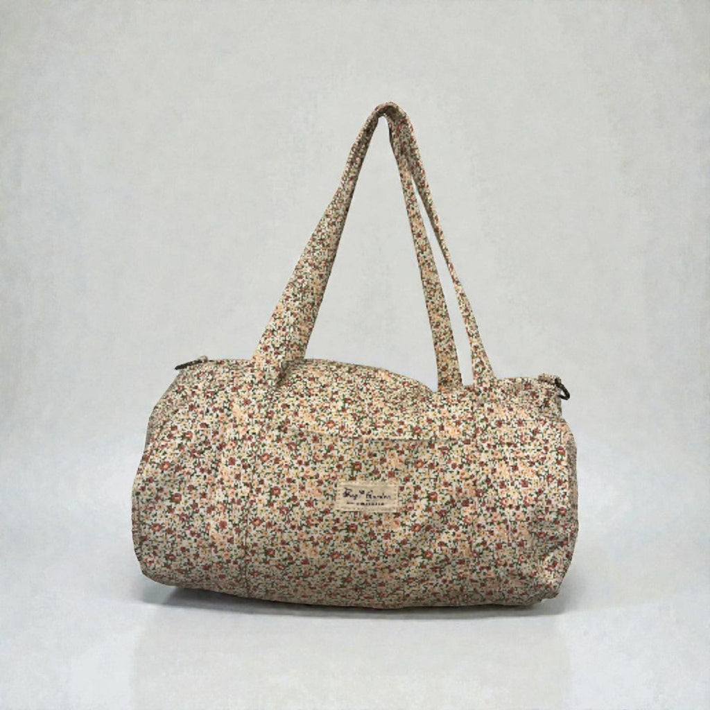 LIBERTY-  Bolsa de viaje azul con flores rosas