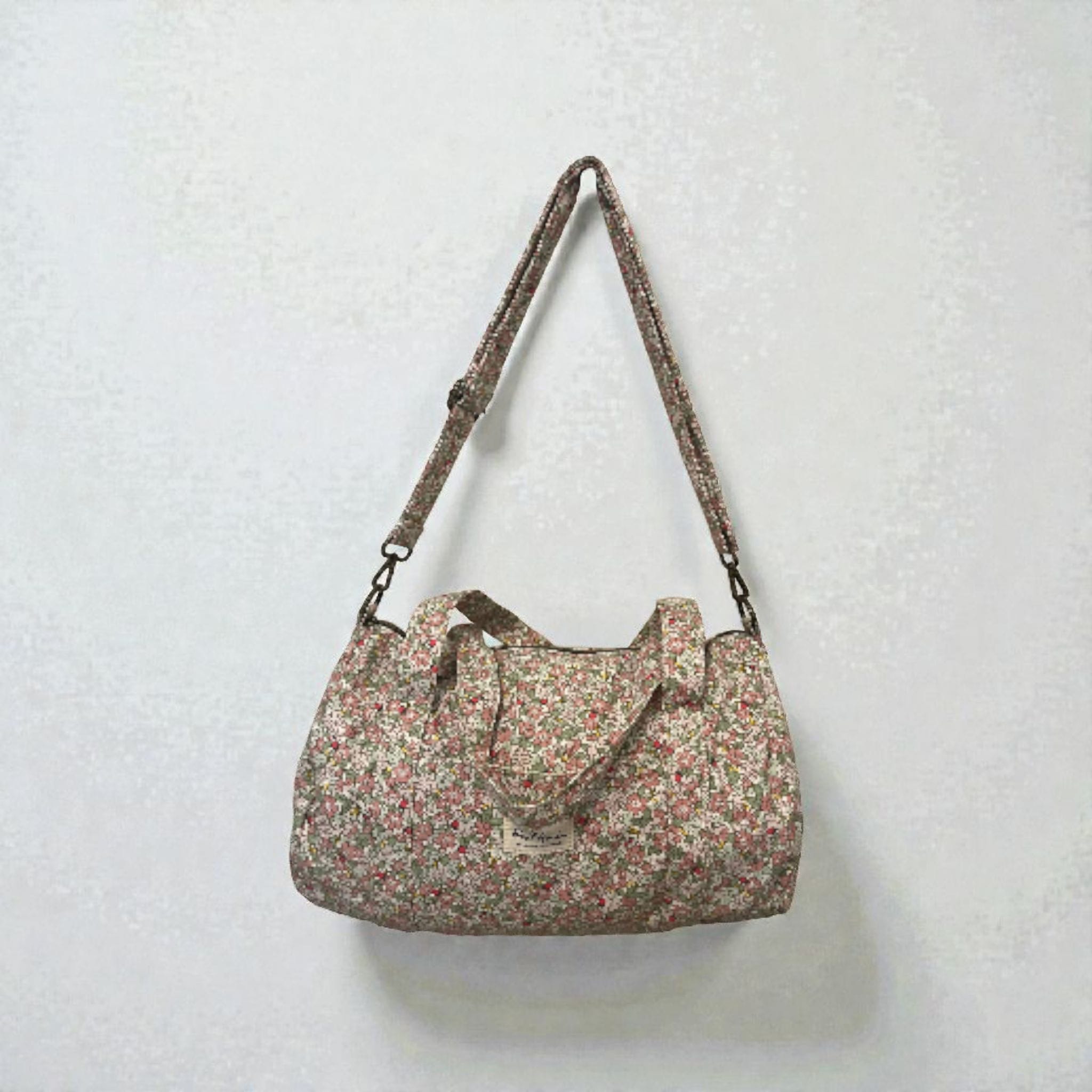 LIBERTY-  Bolsa de viaje con flores rosas y verdes