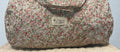 LIBERTY-  Bolsa de viaje azul con flores rosas y verdes